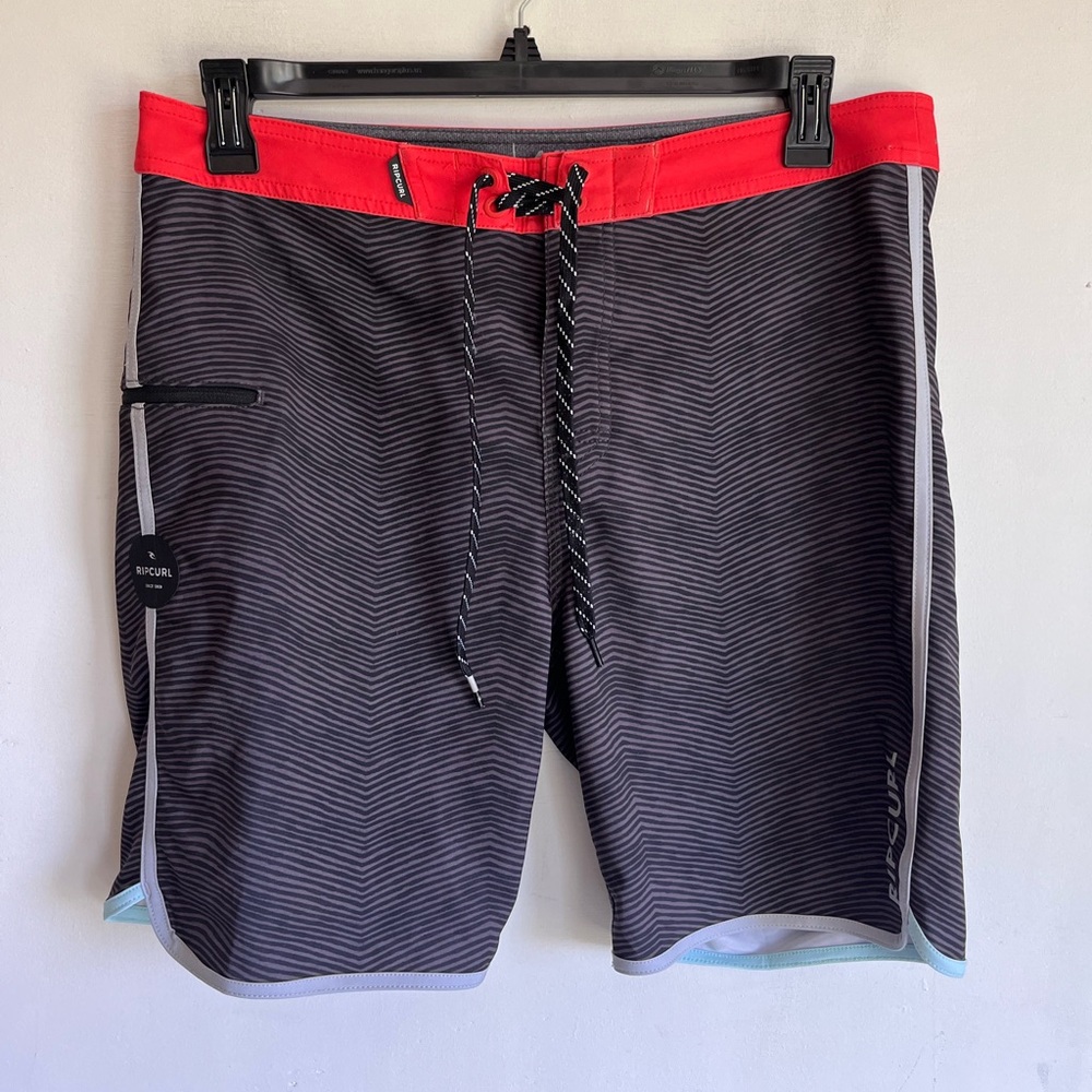Rip Curl Black and Red Board Shorts with gray and blue trim Drawstring Closure
